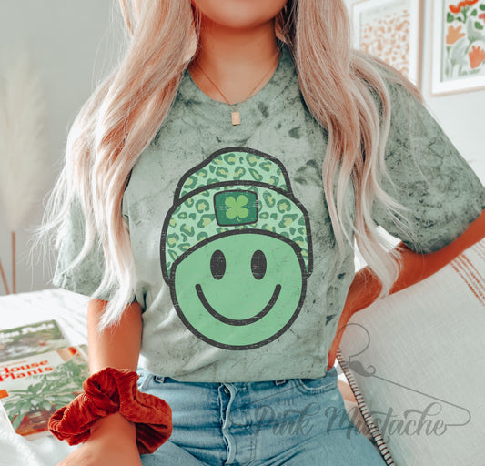 St. Patricks Day Happy Face Beanie Leopard Comfort Colors Color Blast Distressed Tee- Sizes and Inventory Limited