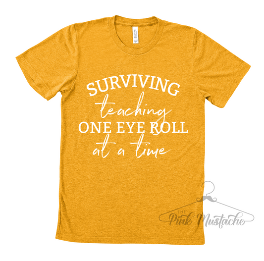 Surviving Teaching One Eye Roll At A Time / Teacher Life Tees / Teacher Shirts